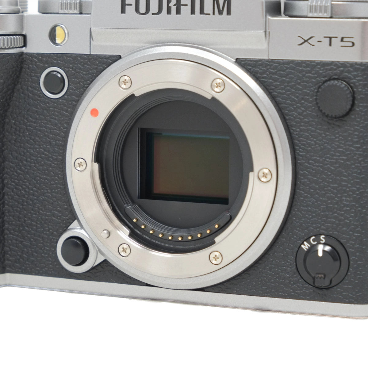 Close-up of a Fujifilm X-T5 camera body on a white background