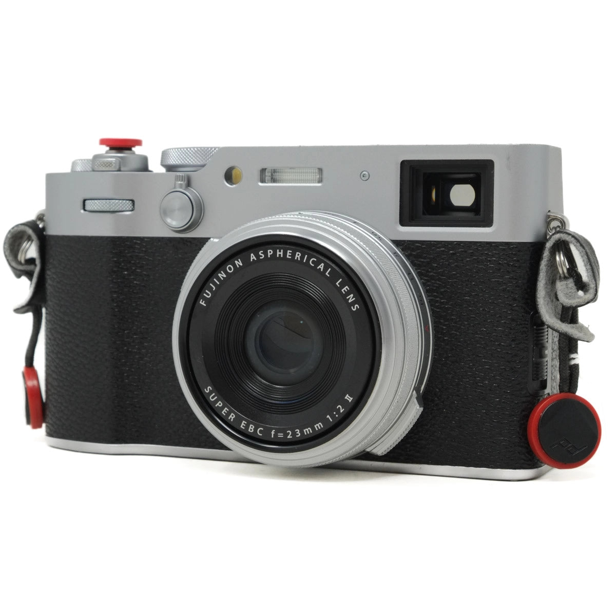 Black and silver camera with red accents on a white background