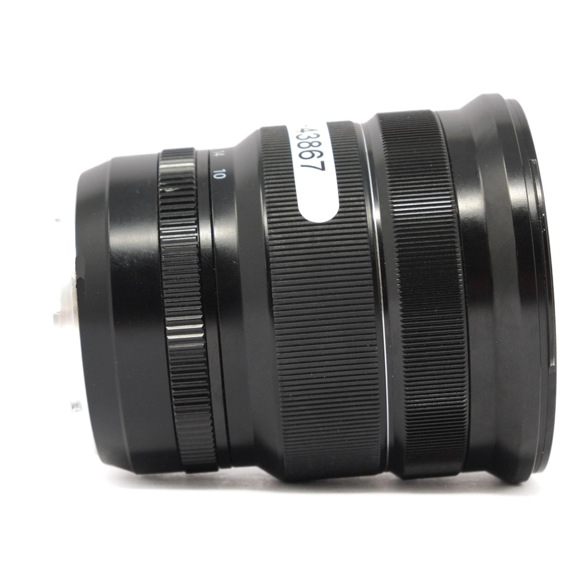 Black camera lens on a white background