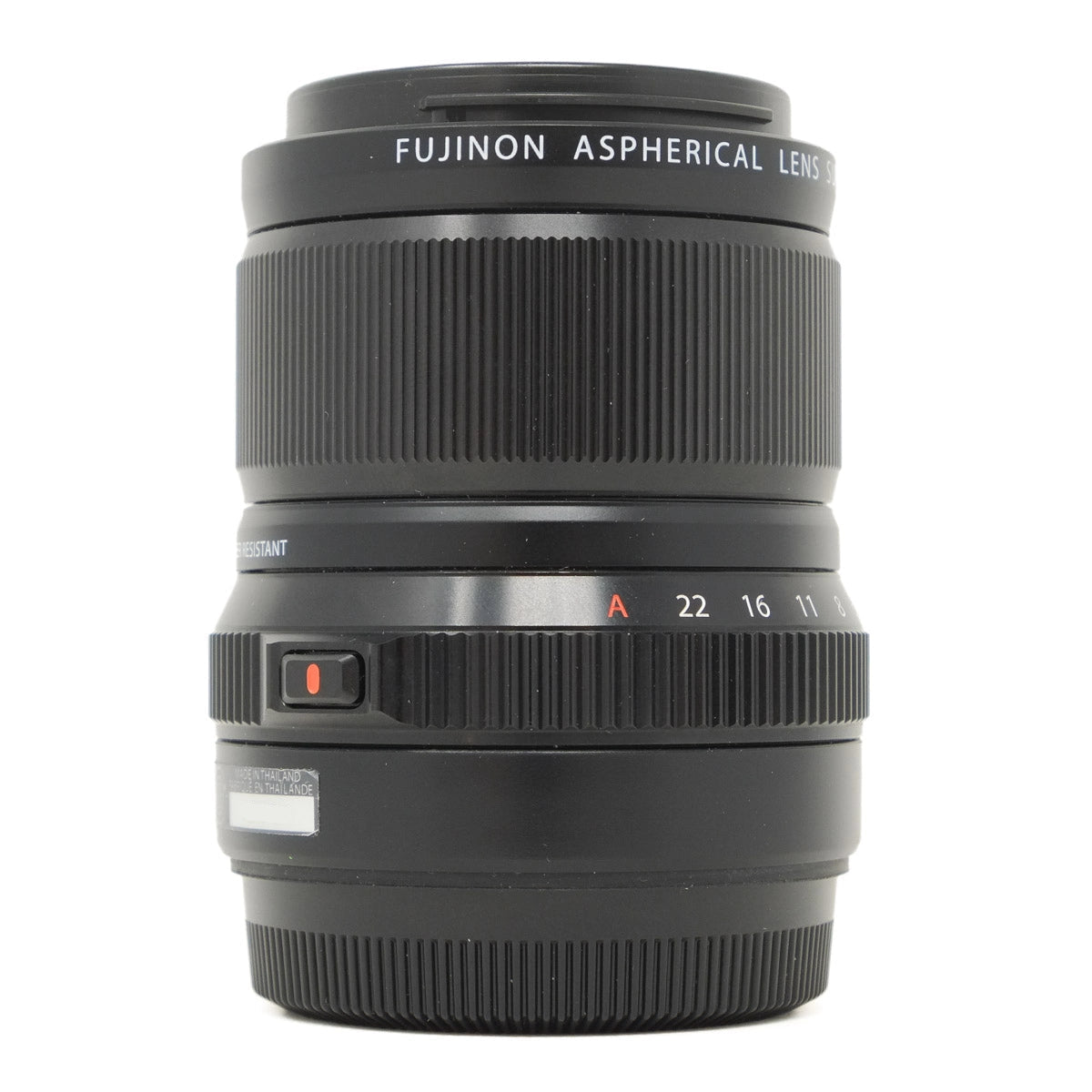 Black Fujifilm camera lens on a white background