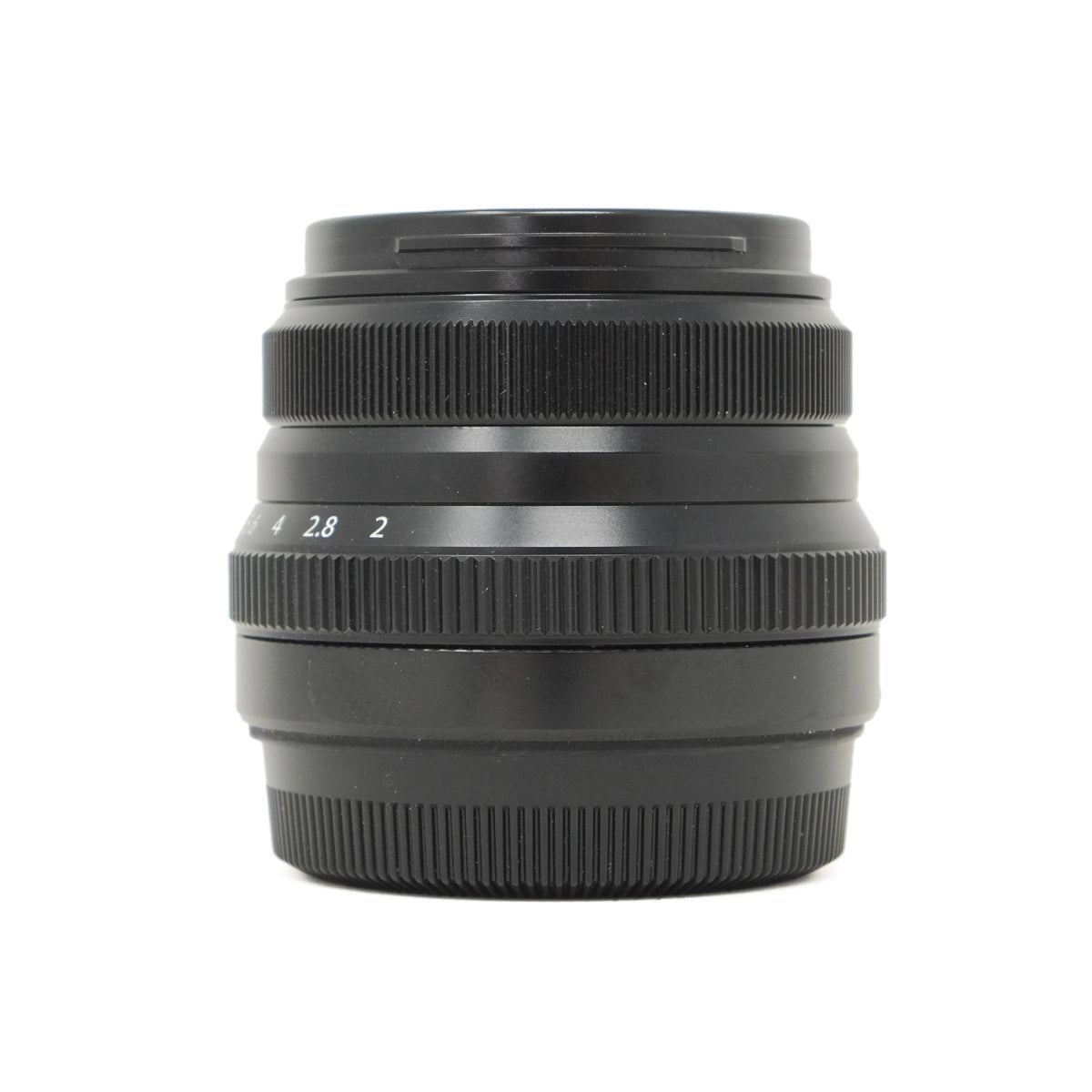 Black camera lens on a white background