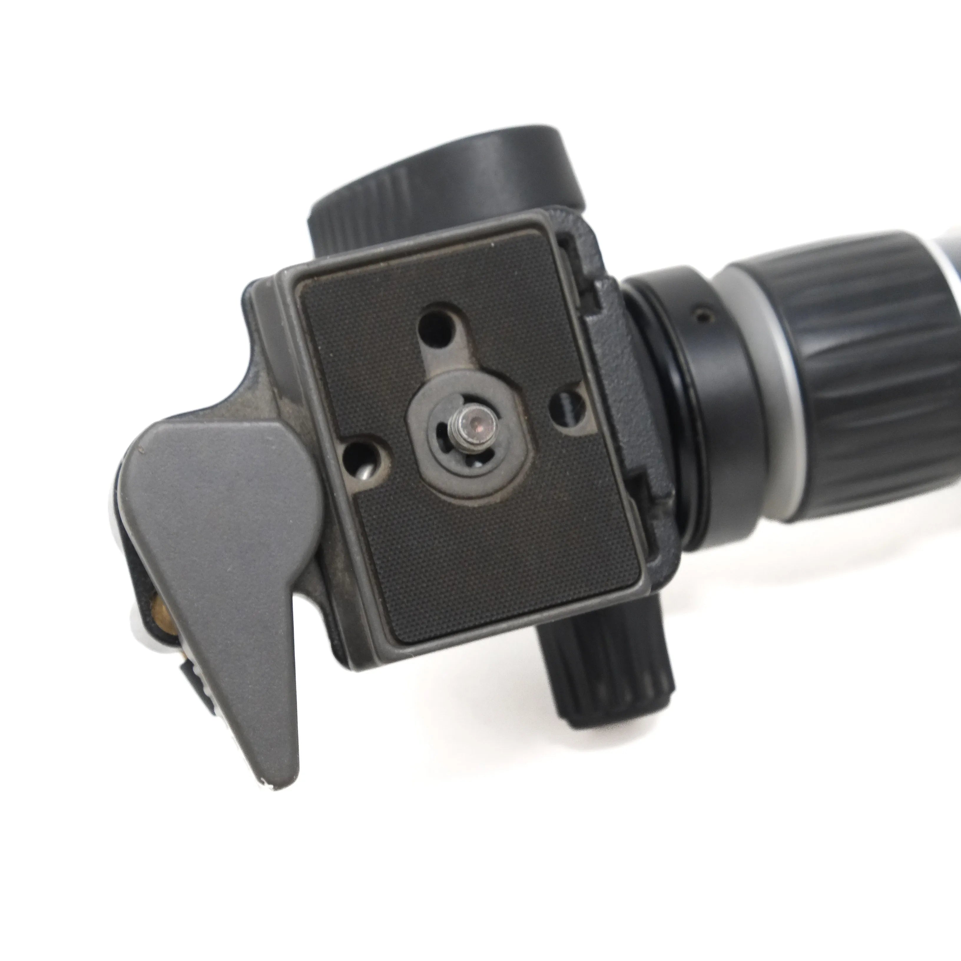 Camera tripod head with quick release plate on a white background