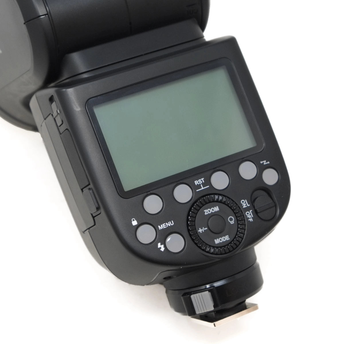 Close-up of a camera flash with control panel on a white background