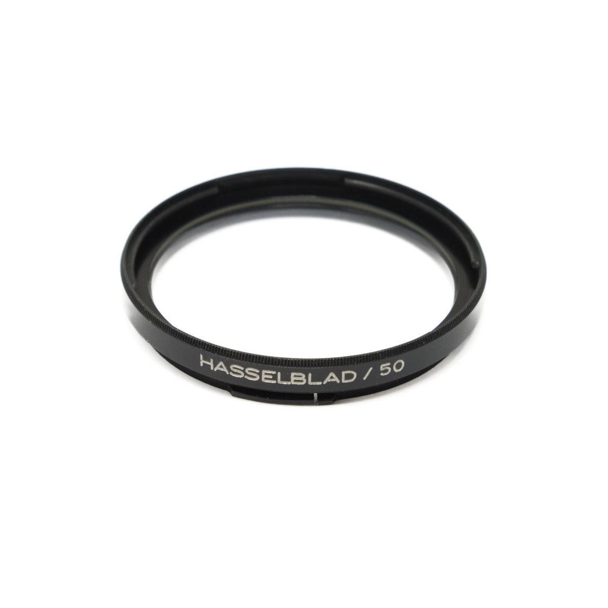 Hasselblad lens filter on a white background
