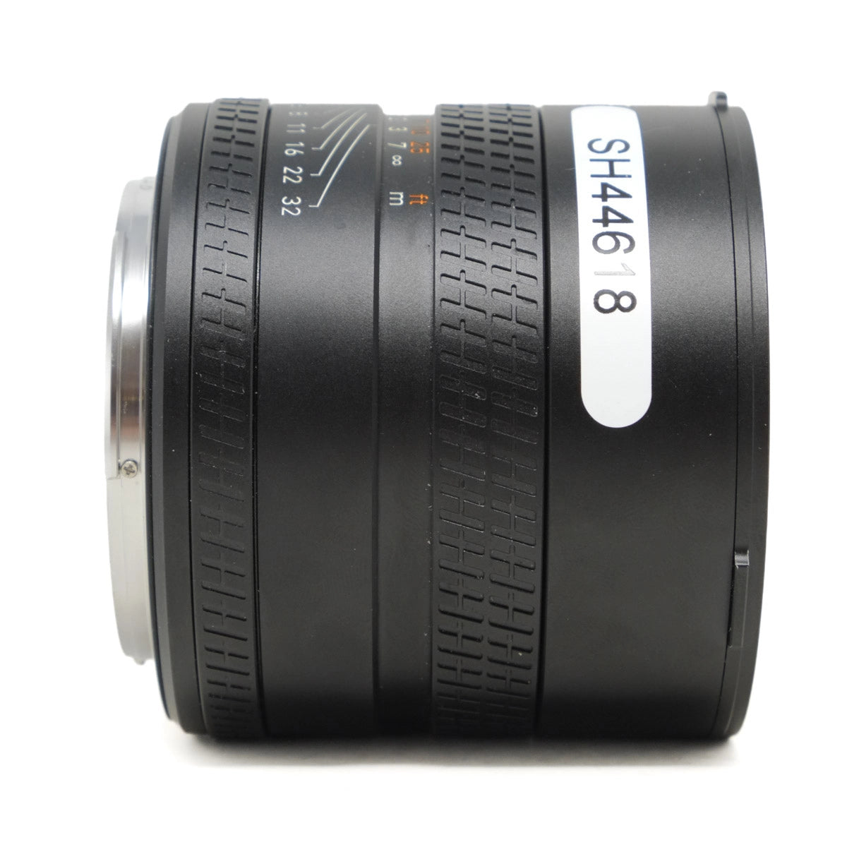 Camera lens with focus ring and brand label on a white background