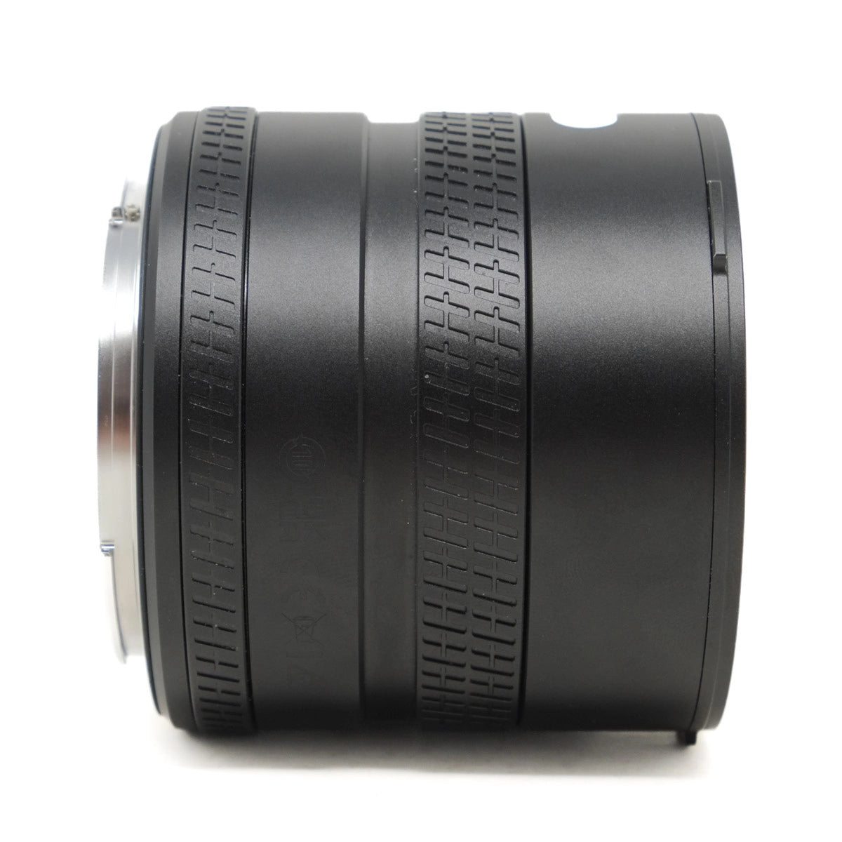 Close-up of a camera lens on a white background