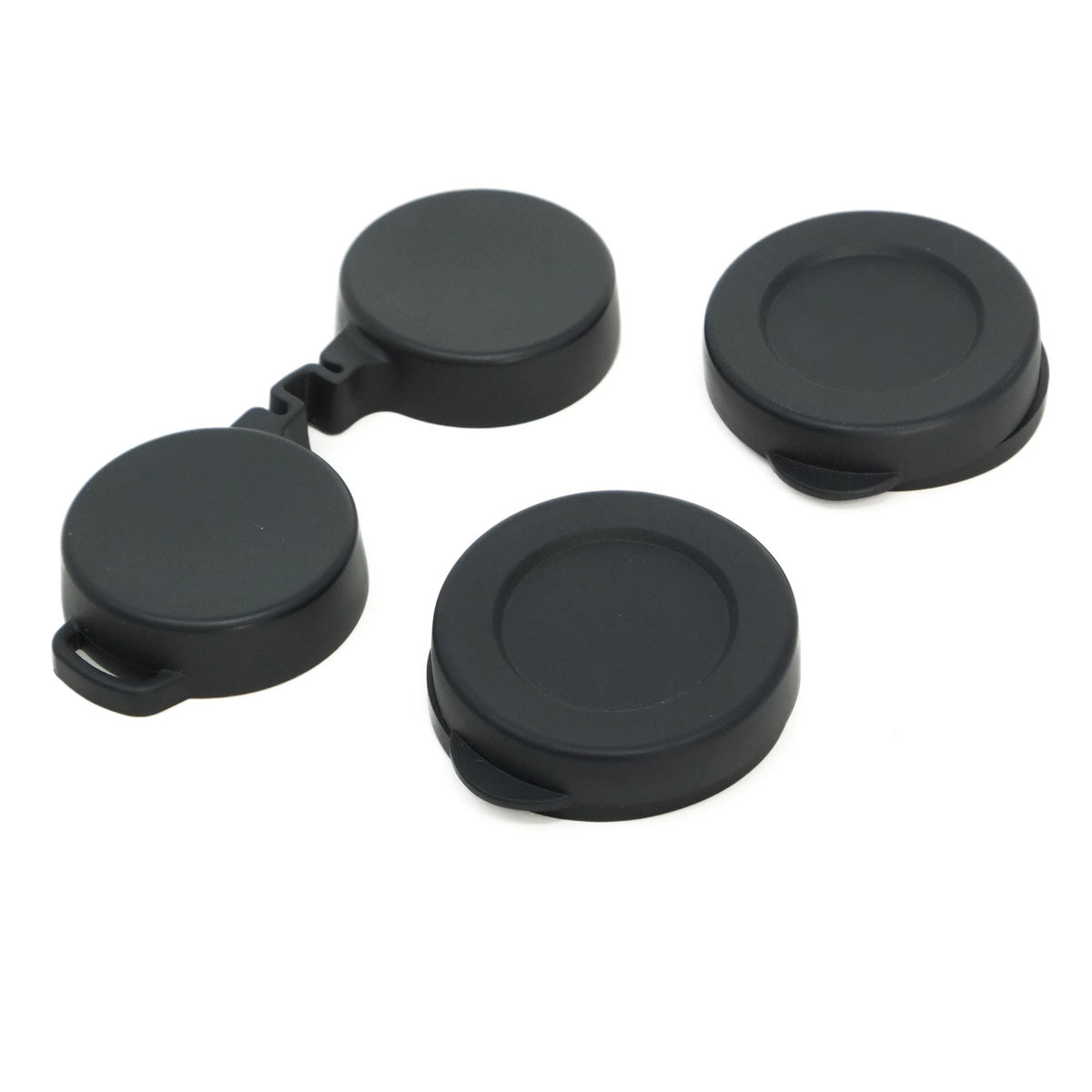 Set of binocular lens caps on a white background
