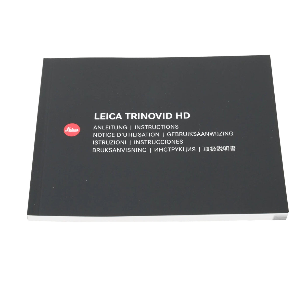 Leica Trinovid HD manual cover, a black hardcover instruction book with white text and the red Leica logo, shown on a plain white background.