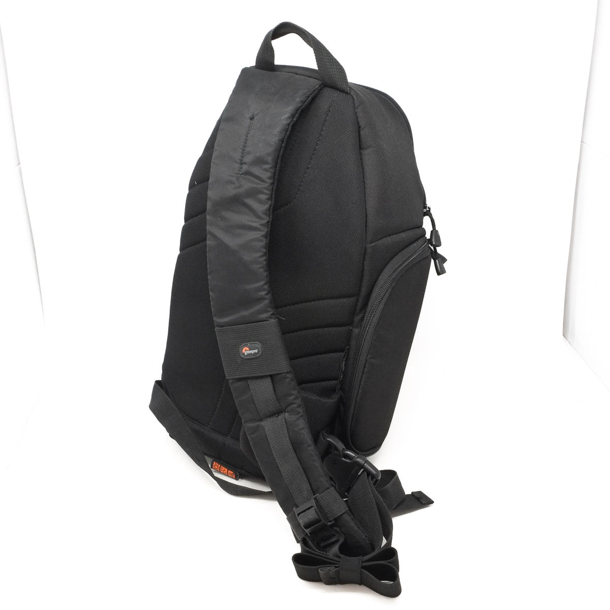 Black backpack with visible branding on a white background