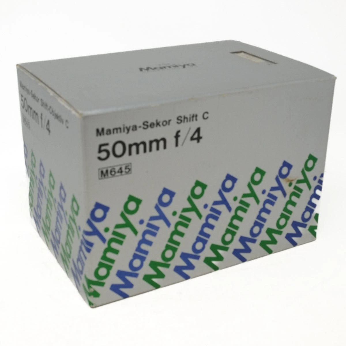 Mamiya camera lens box with branding on a white background