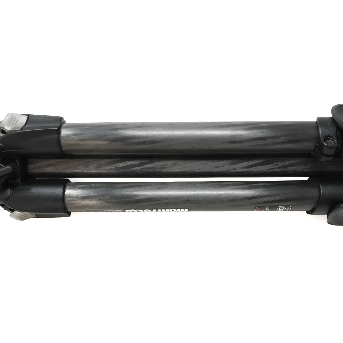 Close-up of a carbon fiber tripod leg with visible gray and black marbled pattern and white branding text on a white background.
