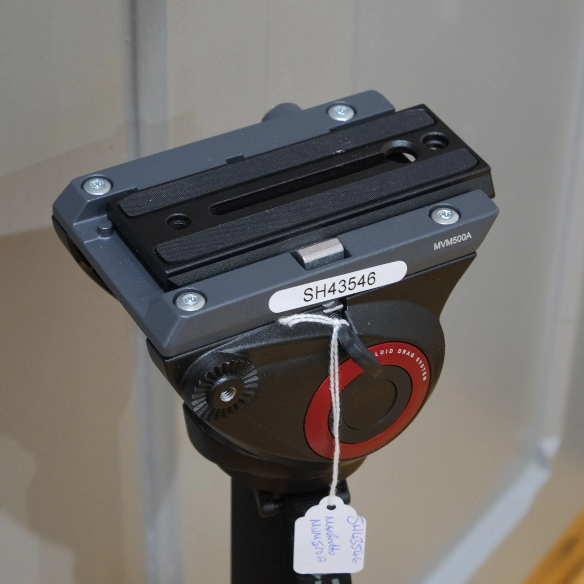 Used Manfrotto MVM500A Monopod with feet and video fluid head - top angle