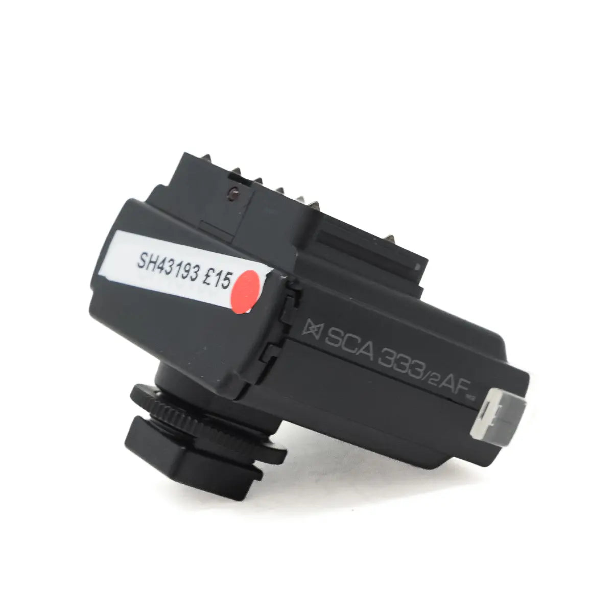 Black electronic component with SCA 3332AF marking on a white background