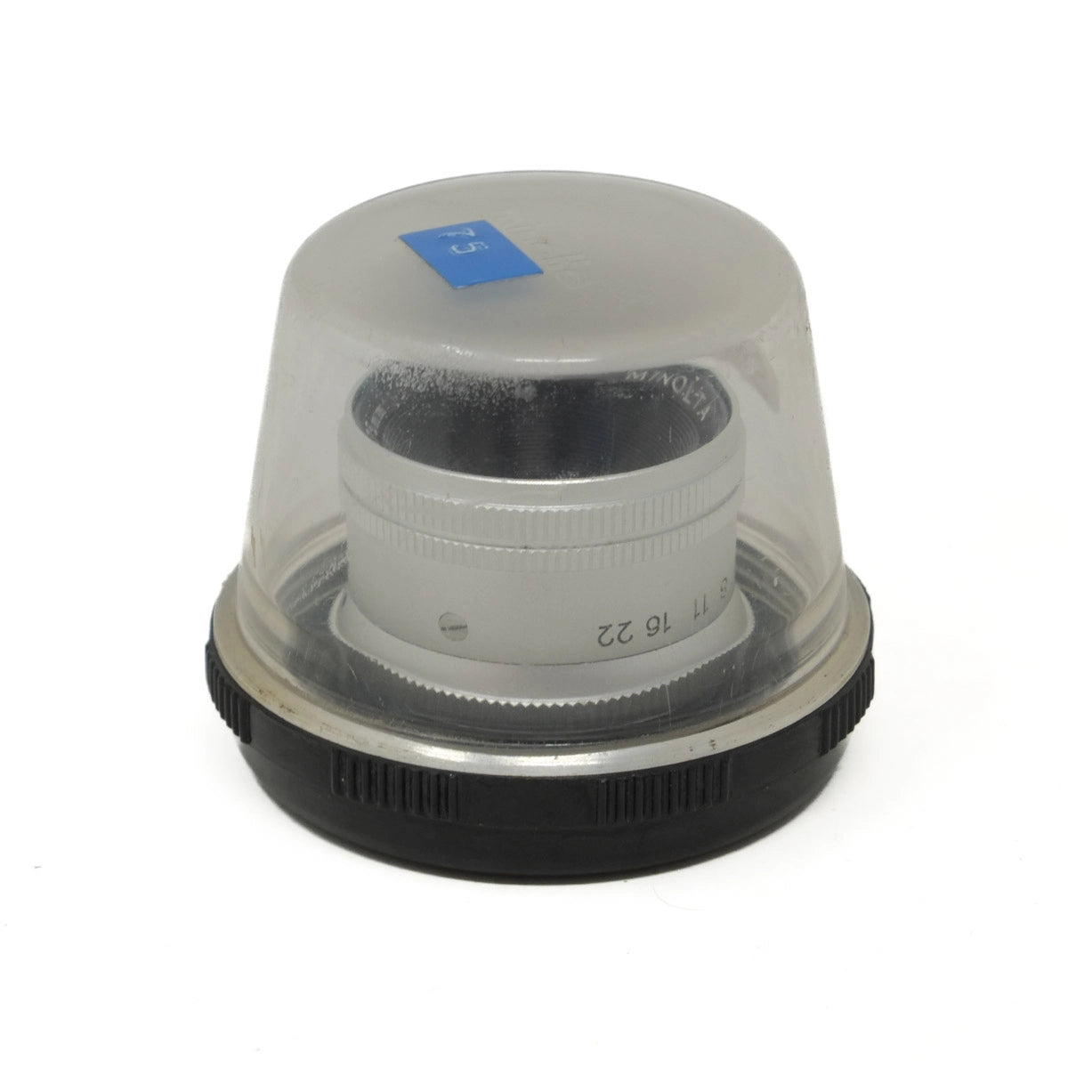 Camera lens with protective dome cover on a white background