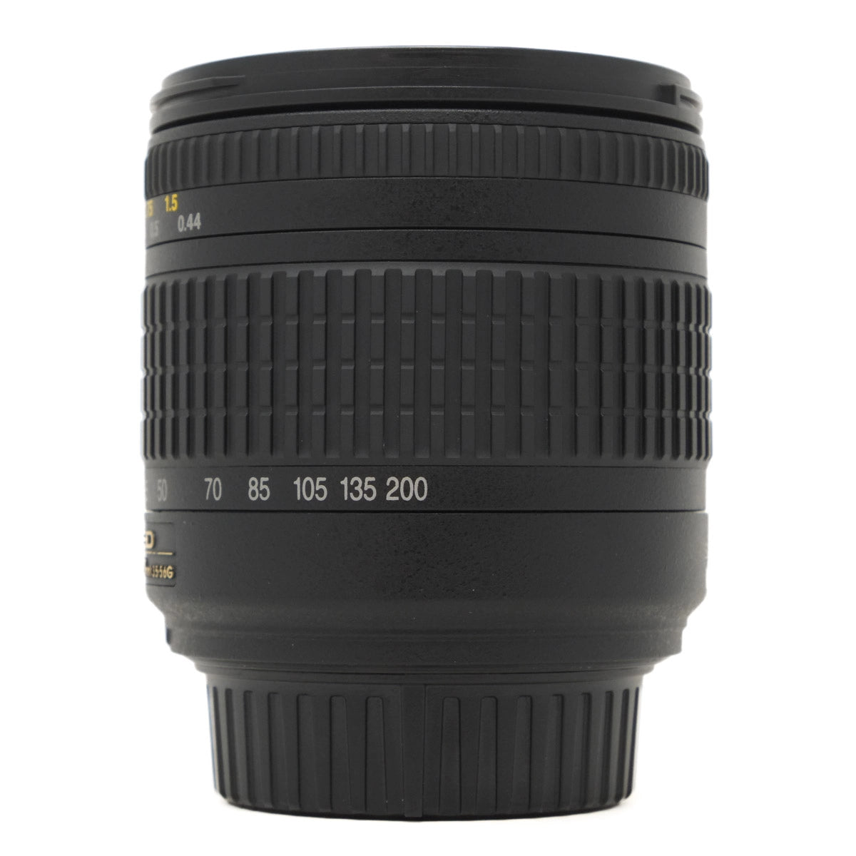 Camera lens with focus distances on a white background