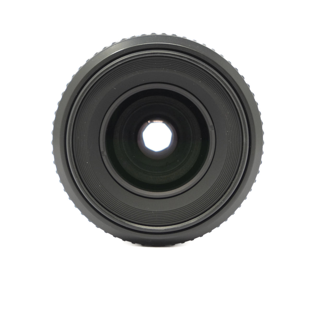 Black camera lens on a white background