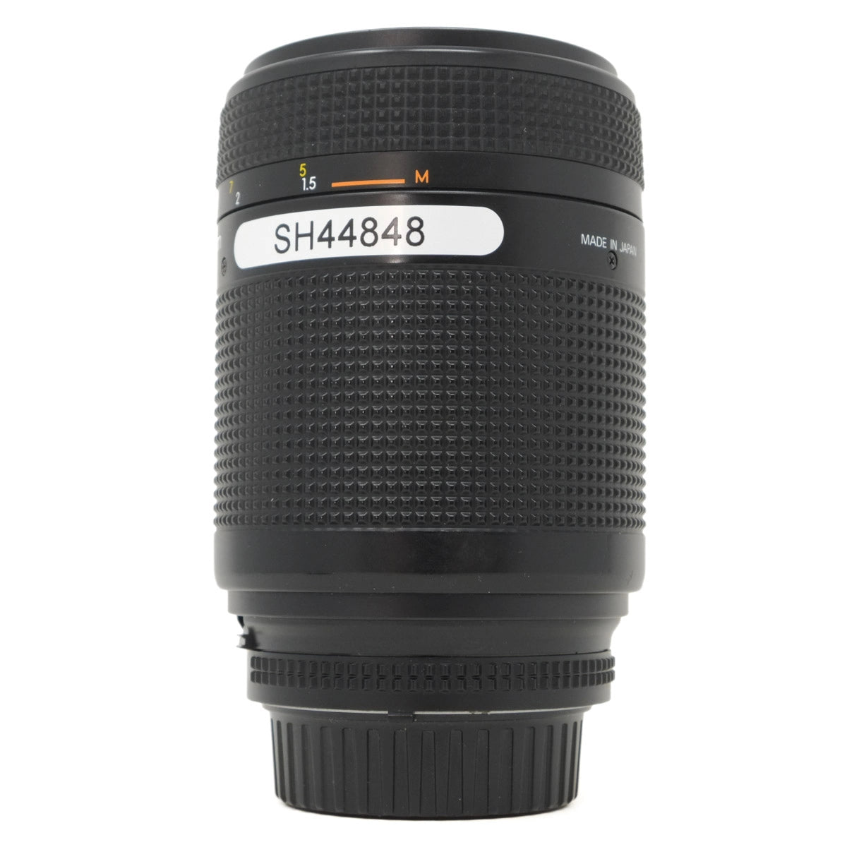 Black camera lens with text and branding on a white background