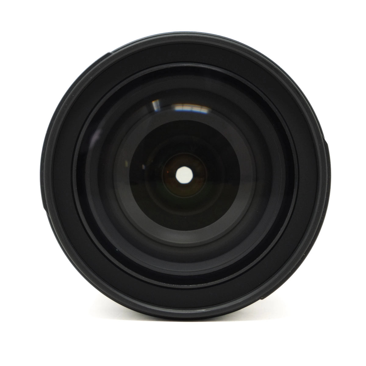 Black camera lens on a white background