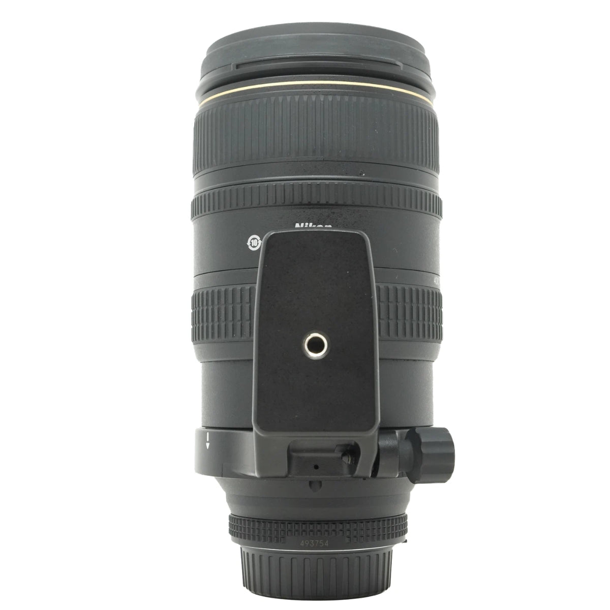 A black Nikon telephoto lens with a mounting adapter, shown from the back to reveal the mount and focus collar, on a solid white background.