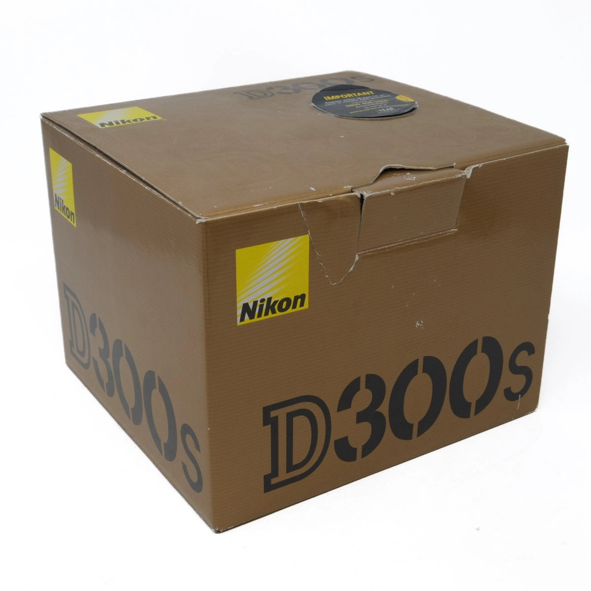 Brown Nikon D300s camera box on a white background