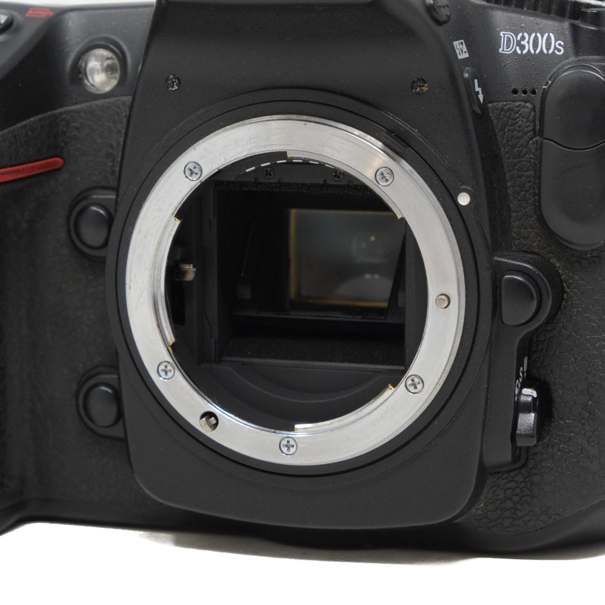 Close-up of a Nikon D300s camera body without a lens.