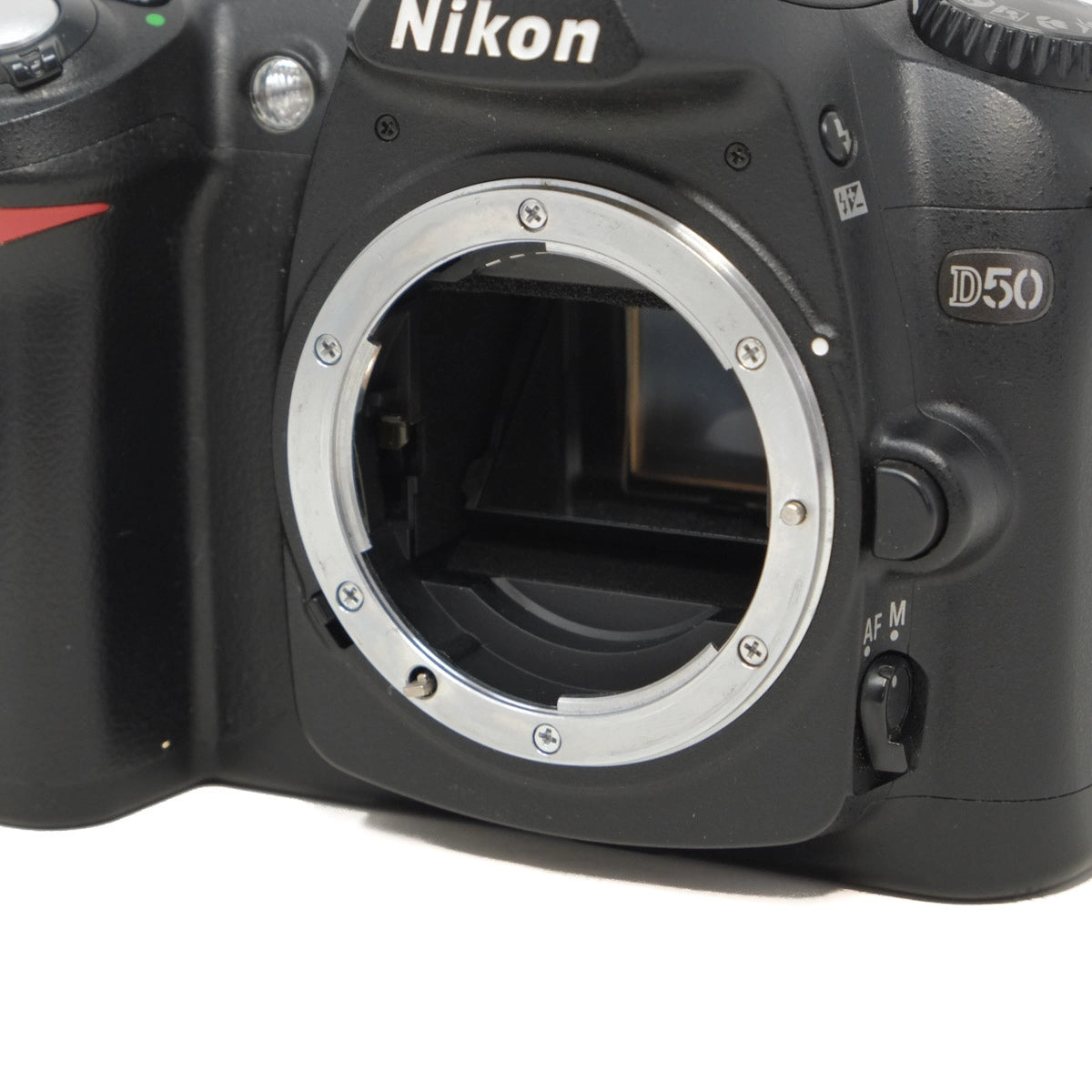Nikon D50 camera body on a white background