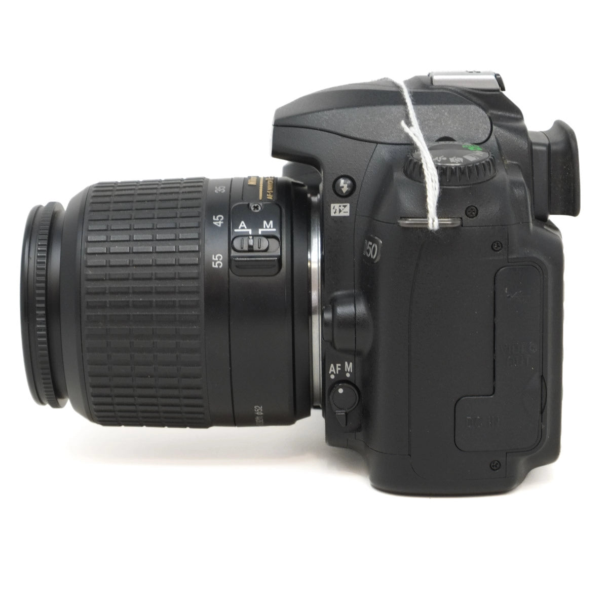 Black DSLR camera with lens on a white background