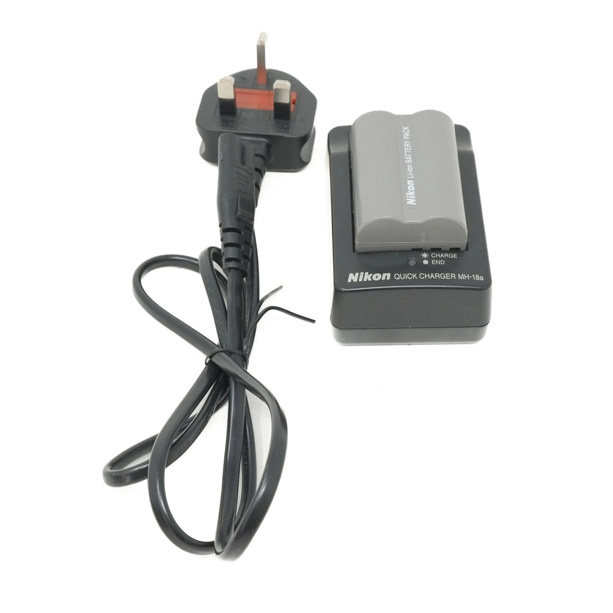 Nikon battery charger with power cord on a white background