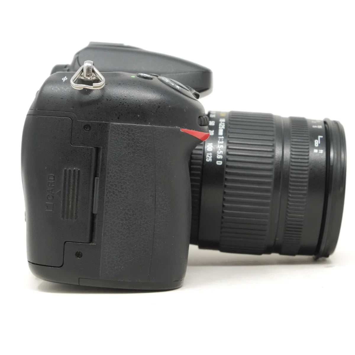 Used Nikon D7100 + Sigma 18-125mm F3.5-5.6 lens - side angle