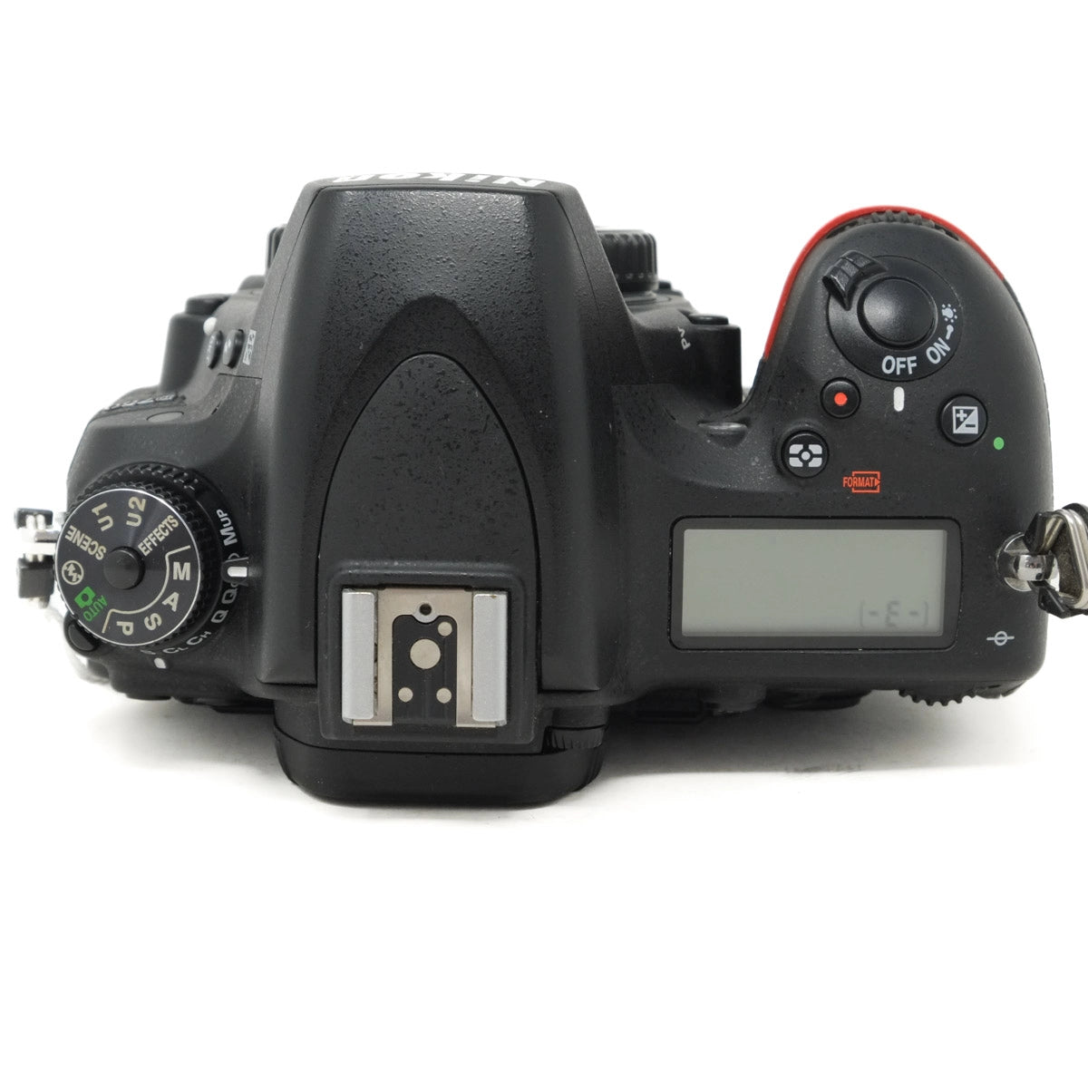 Black DSLR camera on a white background