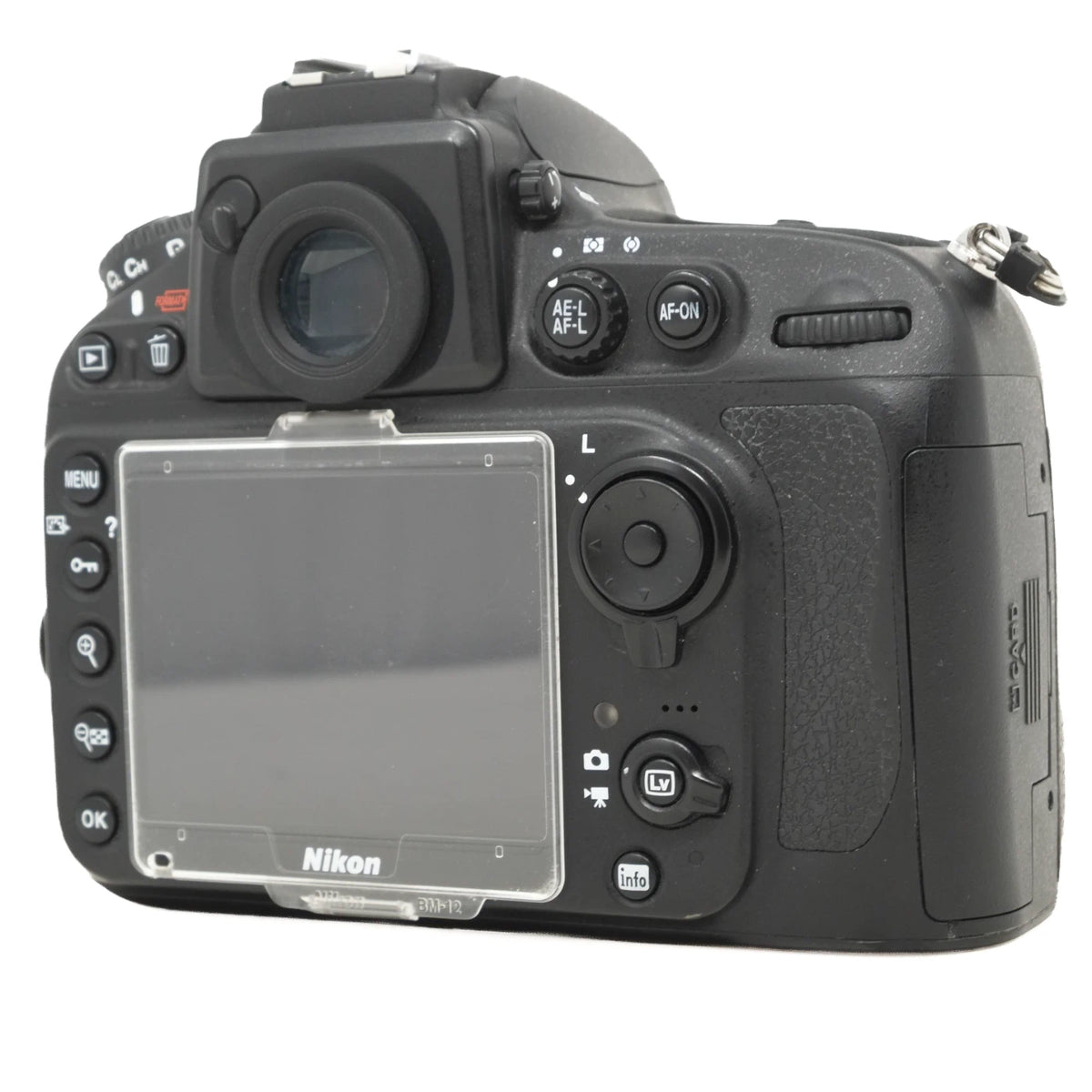 Nikon DSLR camera body rear view with flip-out LCD screen, control buttons, and grip on a white background.