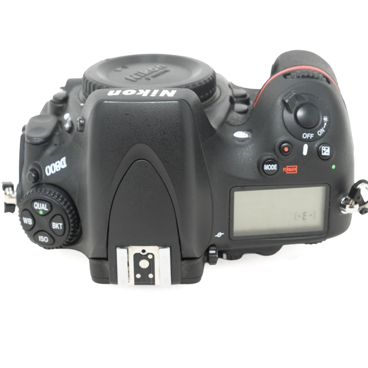 Top-down view of a Nikon D800 DSLR camera body in black, showing the mode dials, hot shoe, and LCD screen on a white background.