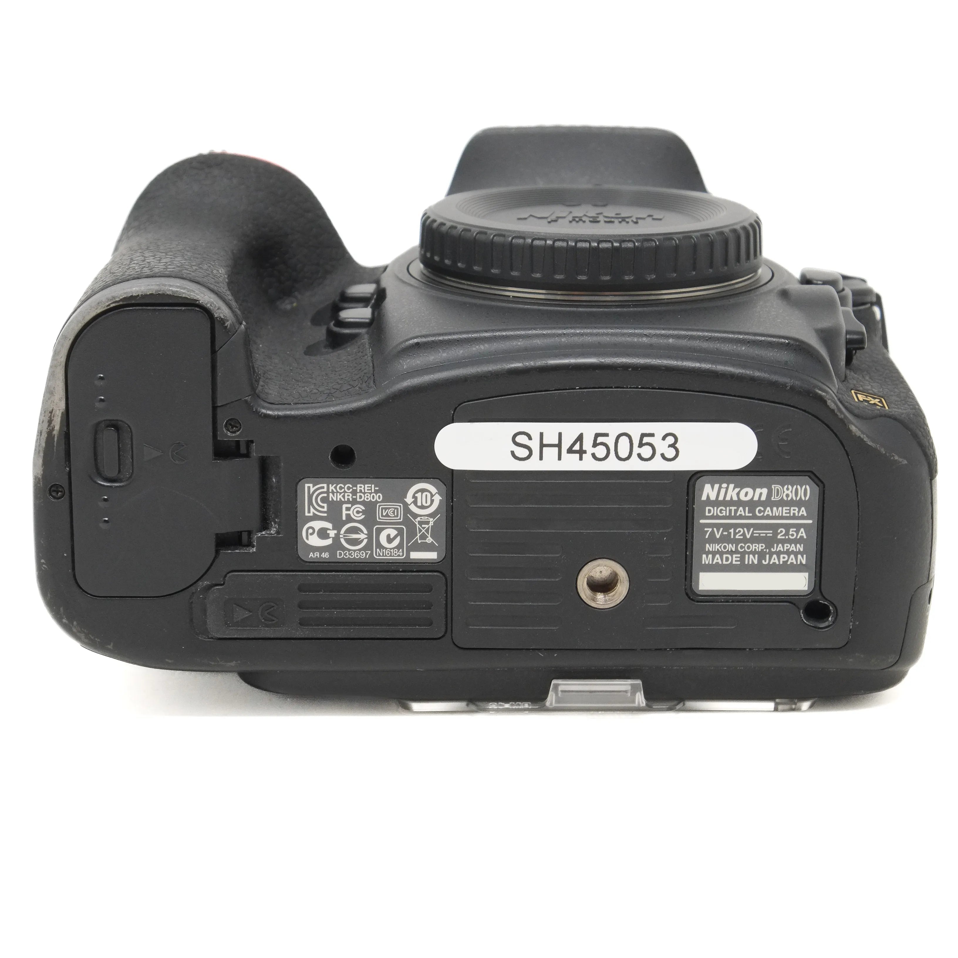 Bottom view of a Nikon D800 digital camera on a white background