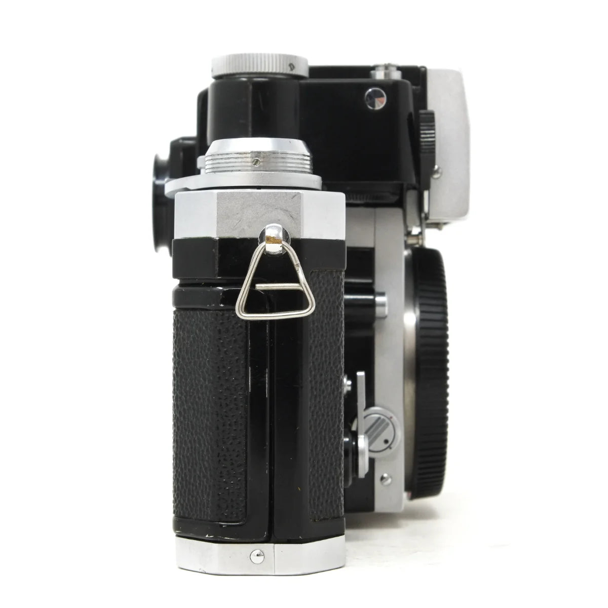 Used Nikon F Photomic Classic film camera with half case - side angle