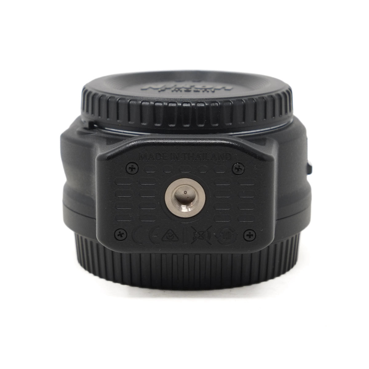 Black camera lens mount adapter on a white background