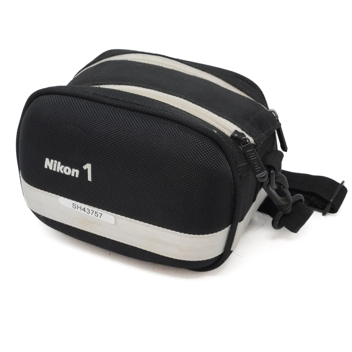 Black and gray camera case with Nikon 1 branding on a white background