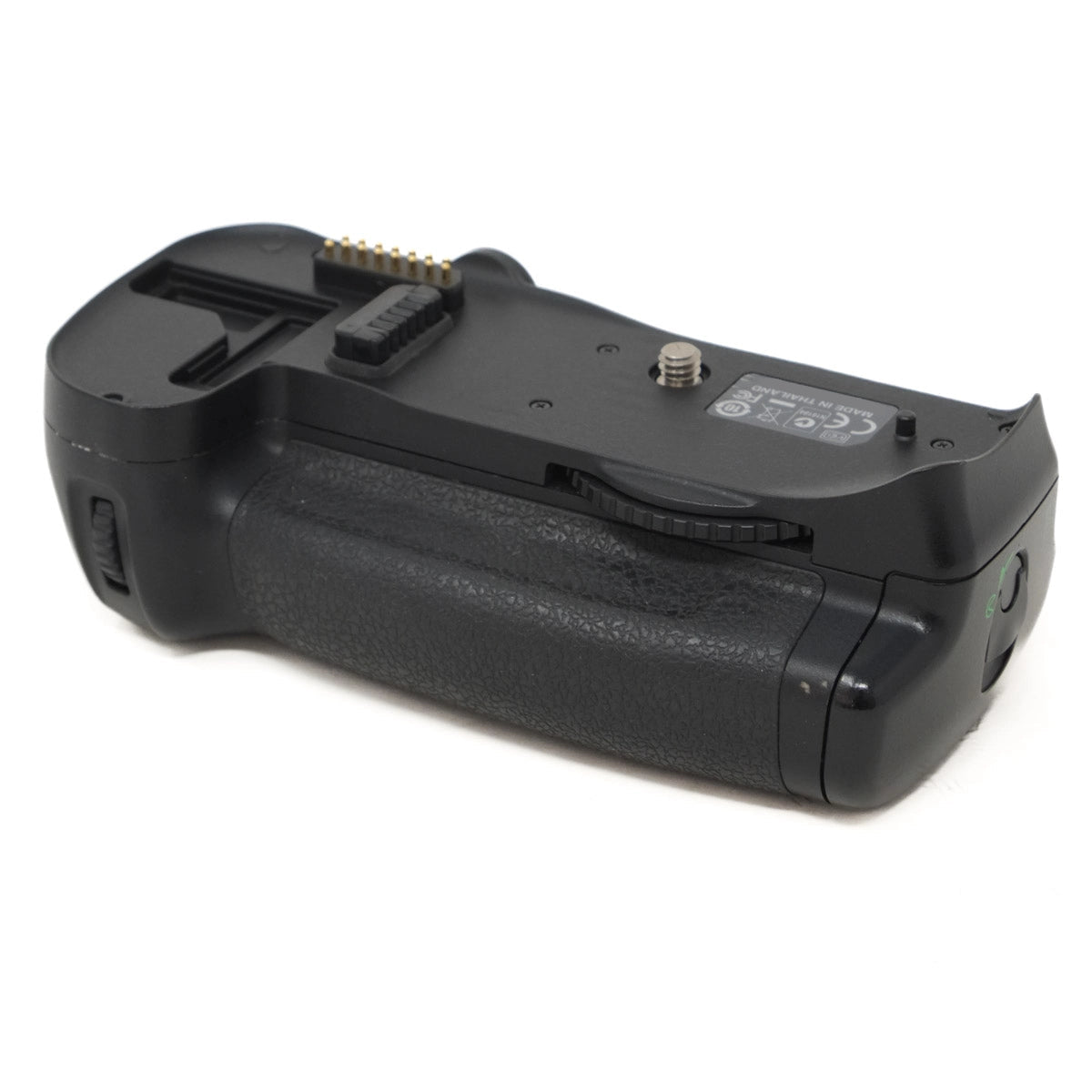 Black camera battery grip on a white background