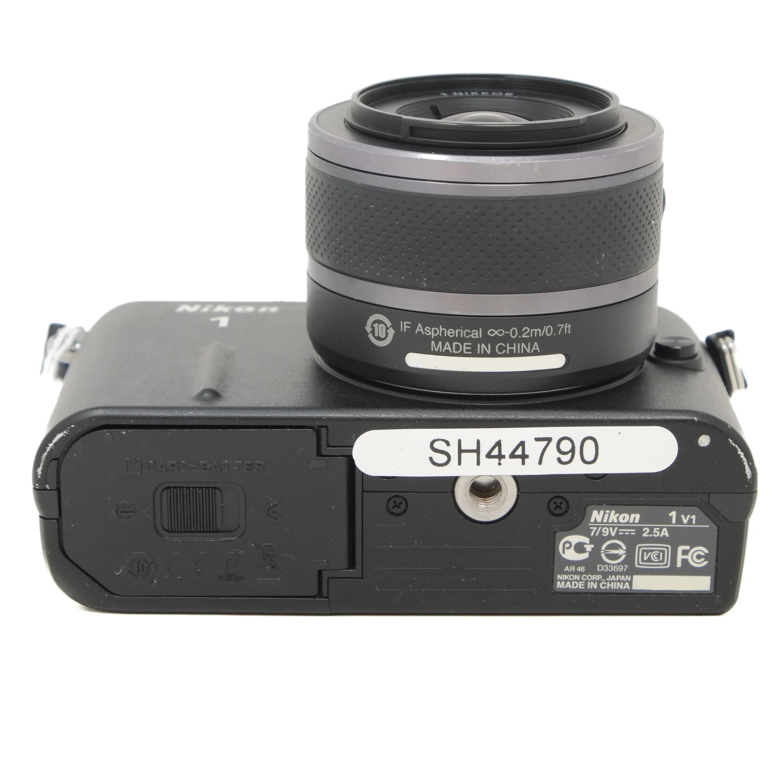 Nikon camera body with lens on a white background