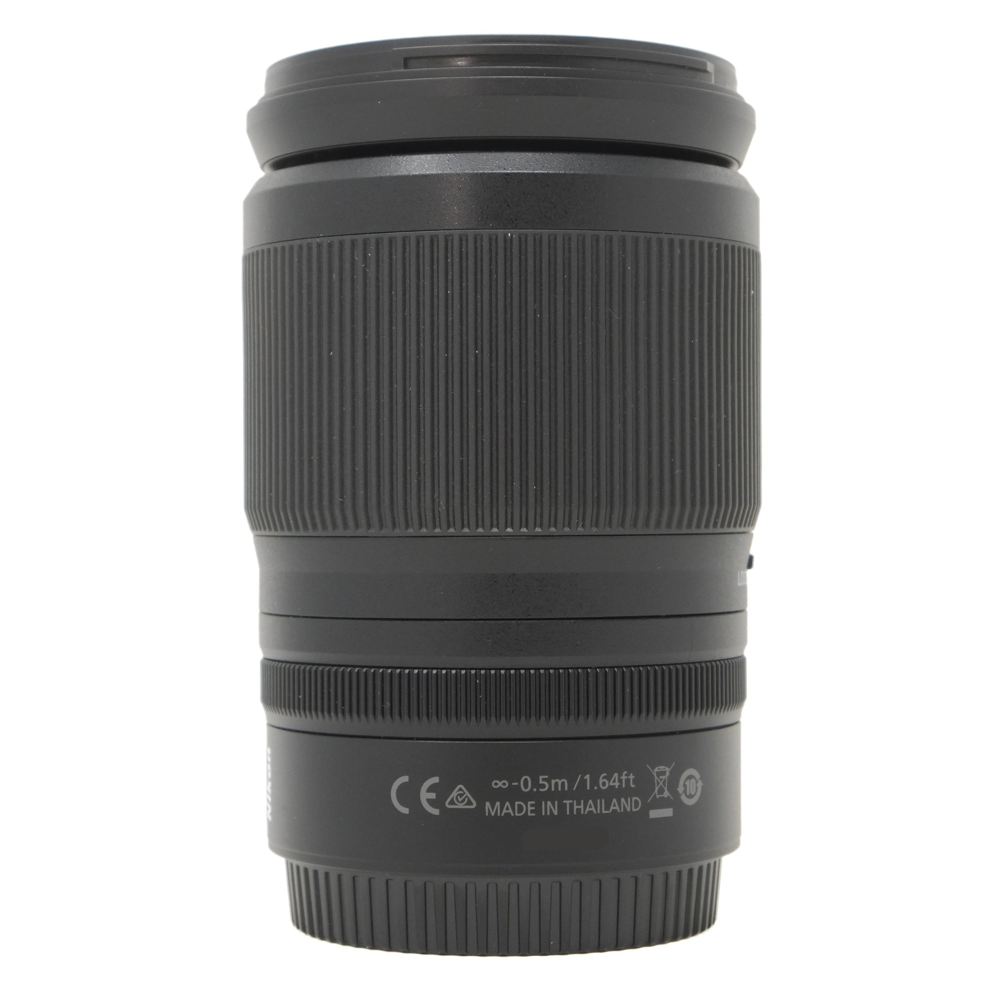 Black camera lens on a white background