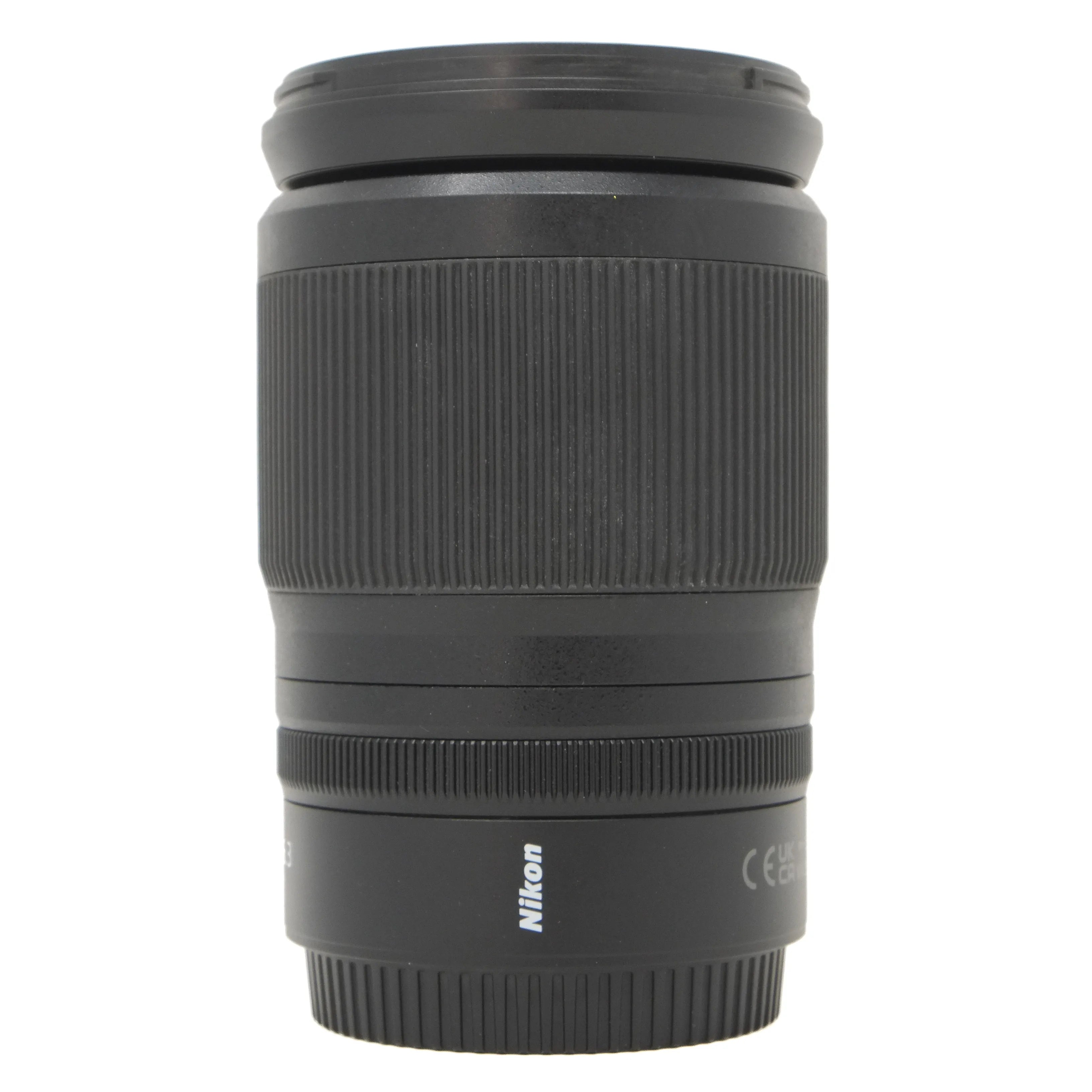 Black Nikon camera lens on a white background
