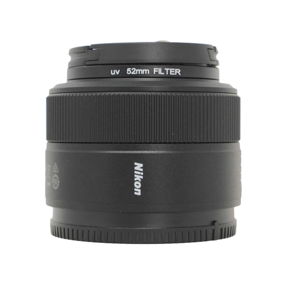 Nikon camera lens with 52mm filter on a white background