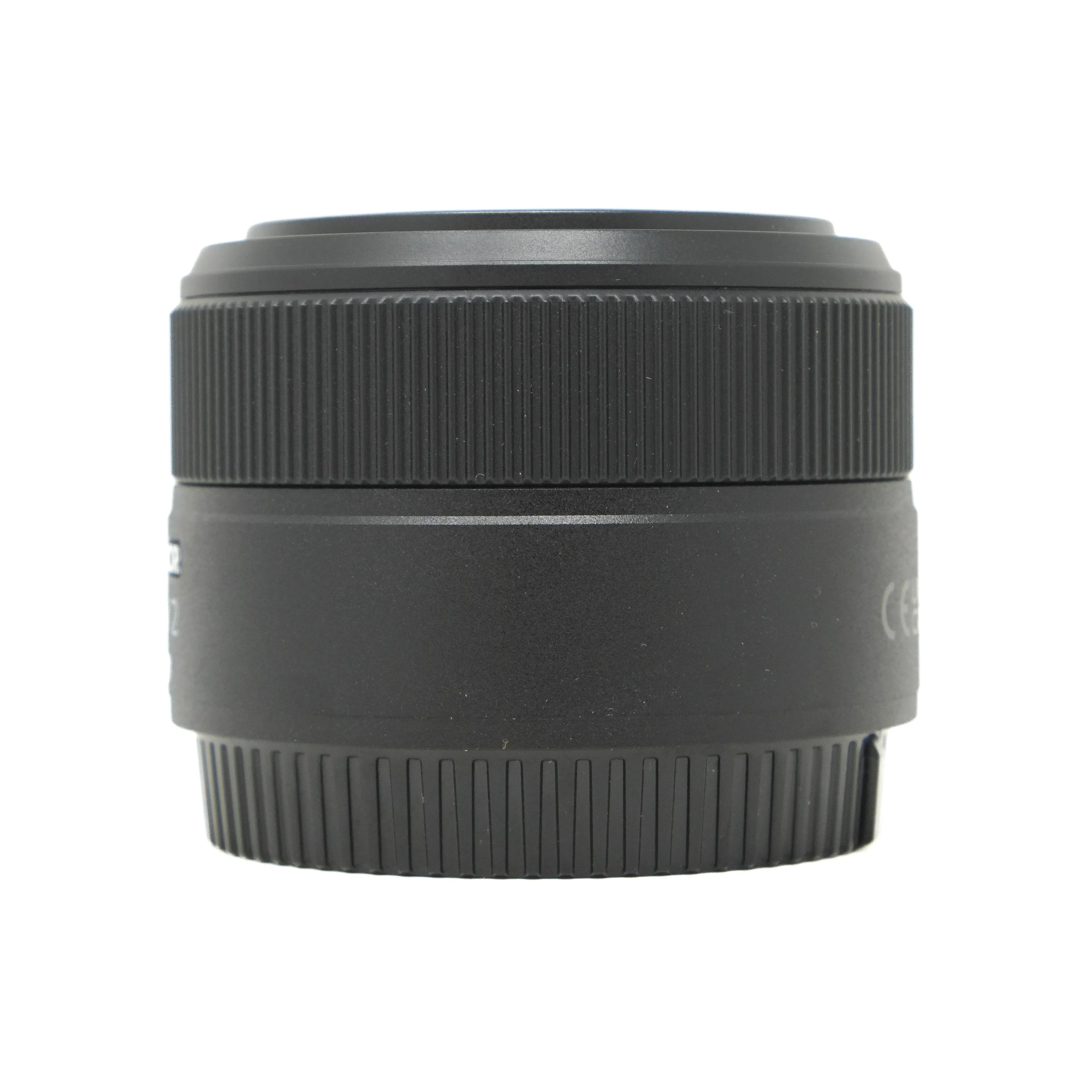 Black camera lens on a white background