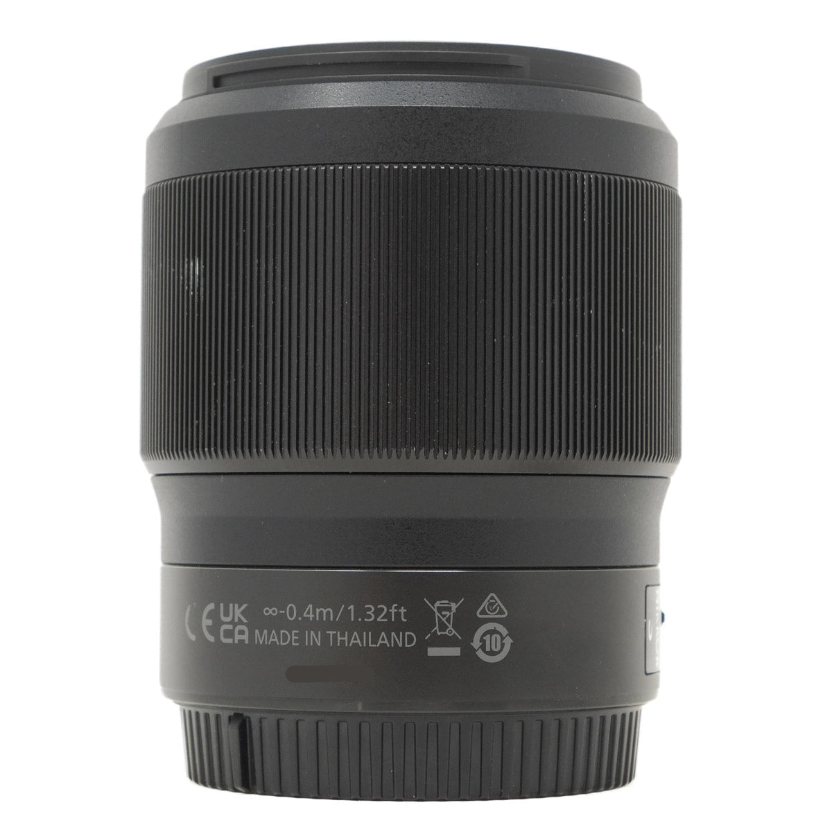 Black camera lens on a white background
