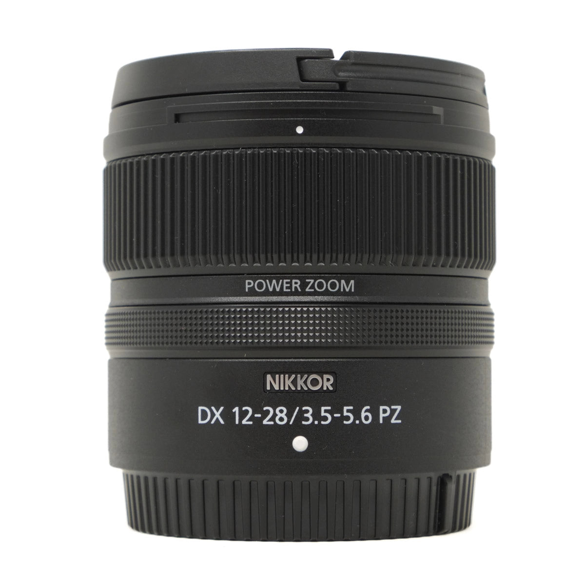 Black camera lens with 'Nikkor' branding on a white background