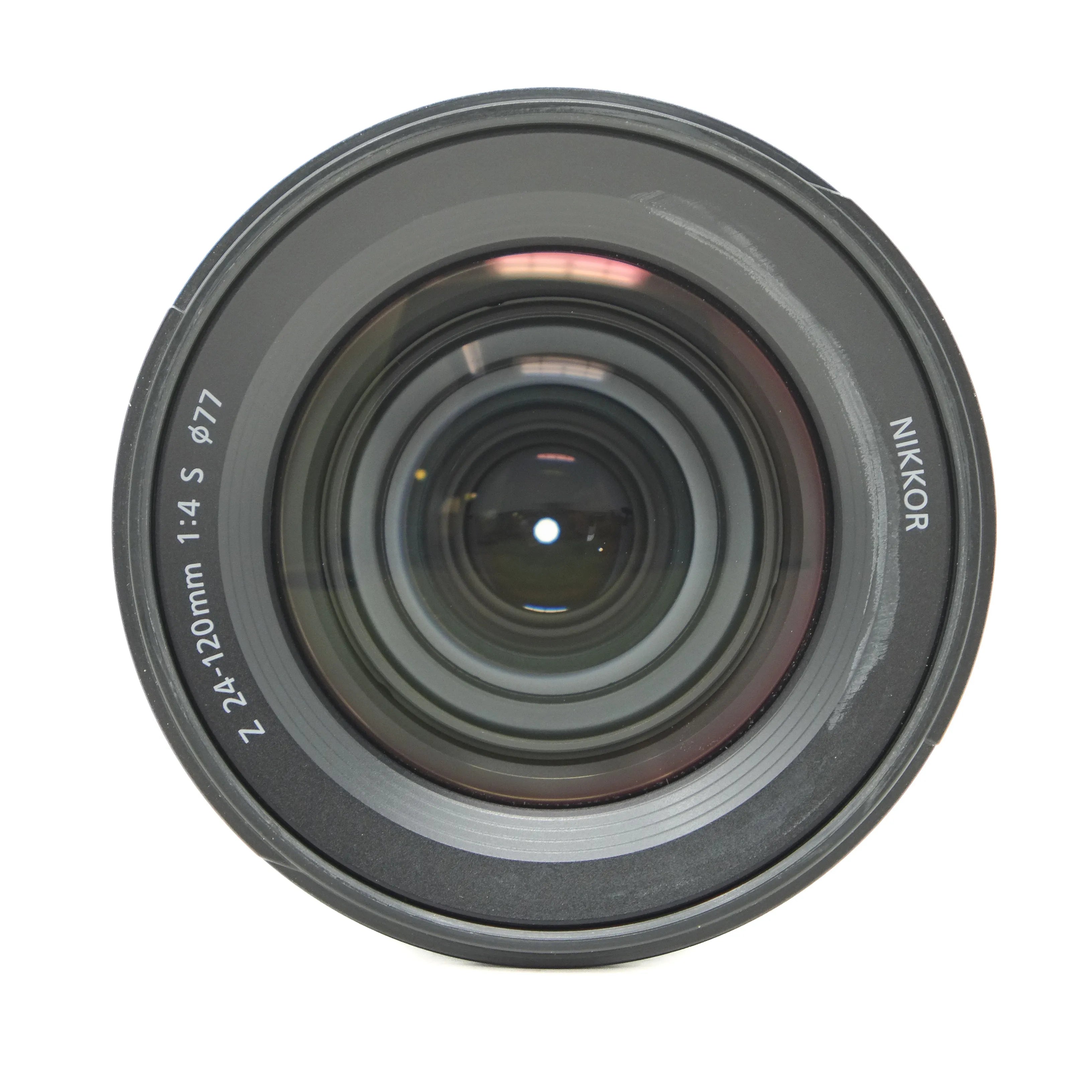 Camera lens with 'Nikkor' branding on a white background