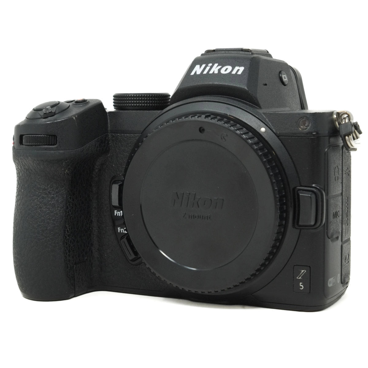 Black Nikon camera body on a white background