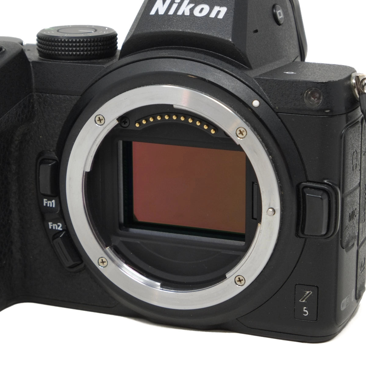 Nikon camera body without a lens on a white background