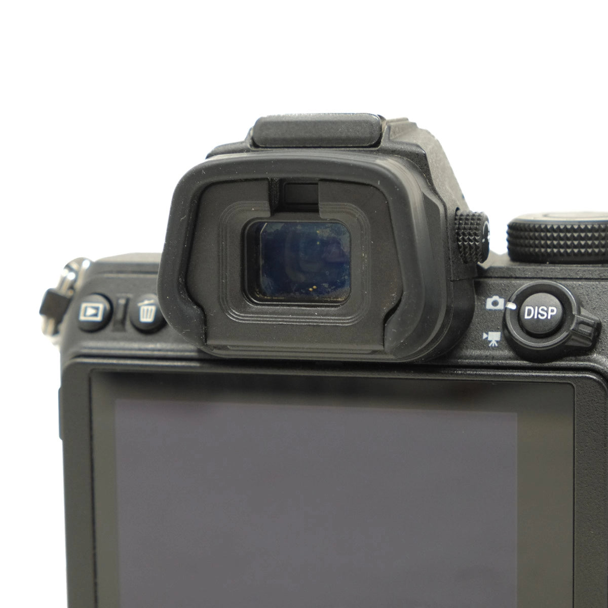 Camera eyepiece and control buttons on a white background