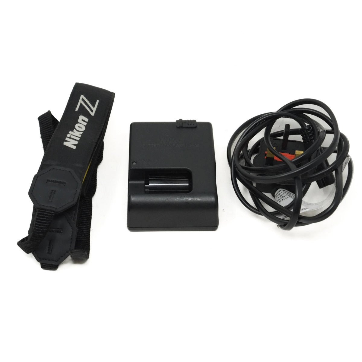 Nikon camera strap, battery, and cable on a white background