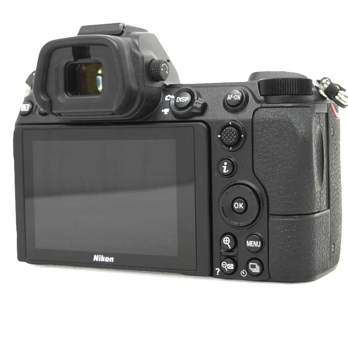 Nikon mirrorless camera rear view showing the LCD screen, viewfinder, and control buttons on a white background.